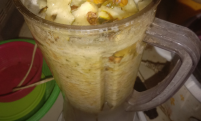Kulit nanas segar yang digunakan sebagai bahan asas untuk membuat baja organik di rumah.