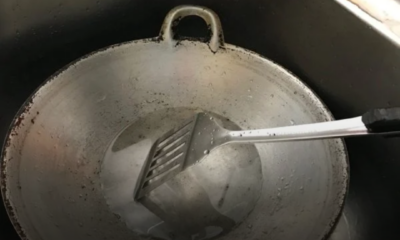 Kuali panas di atas dapur yang tidak digalakkan disiram dengan air sejuk selepas memasak.